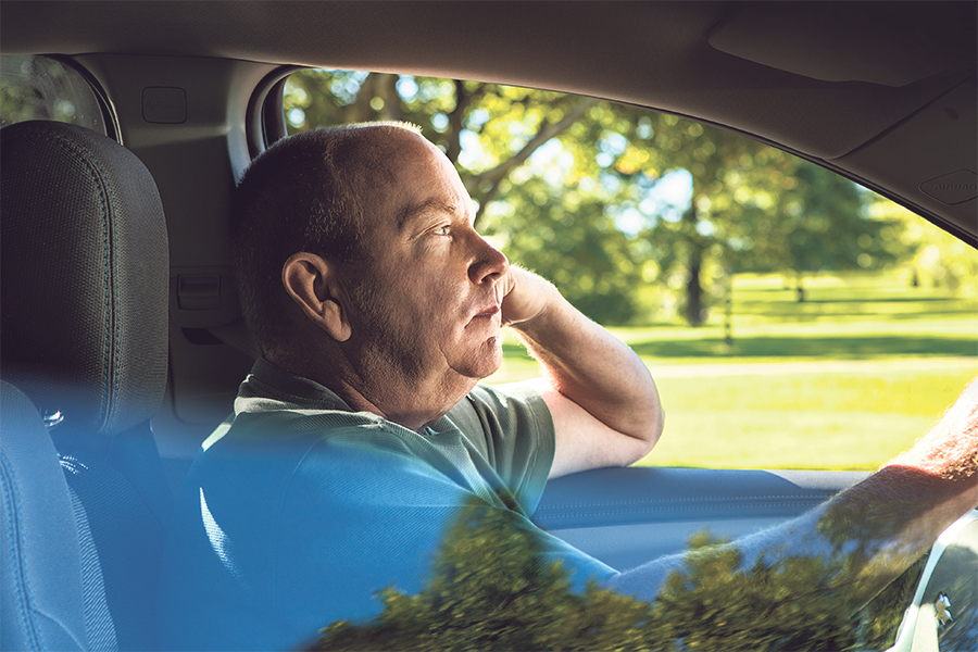 Man driving car